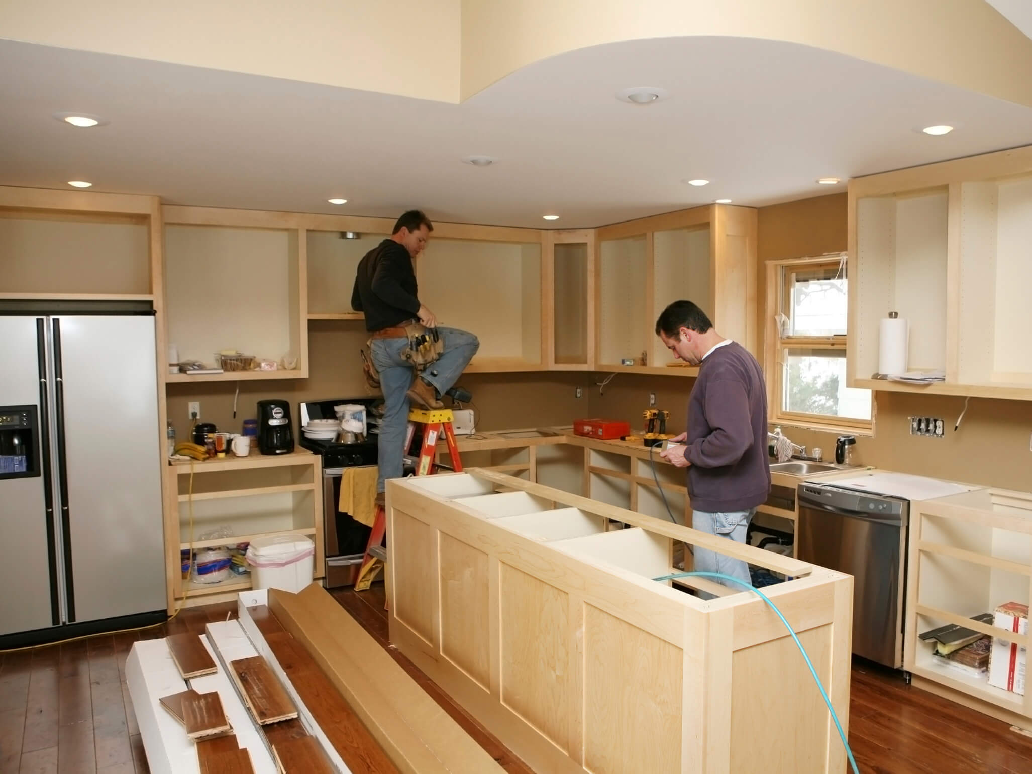 Arizona home with contractors renovating kitchen